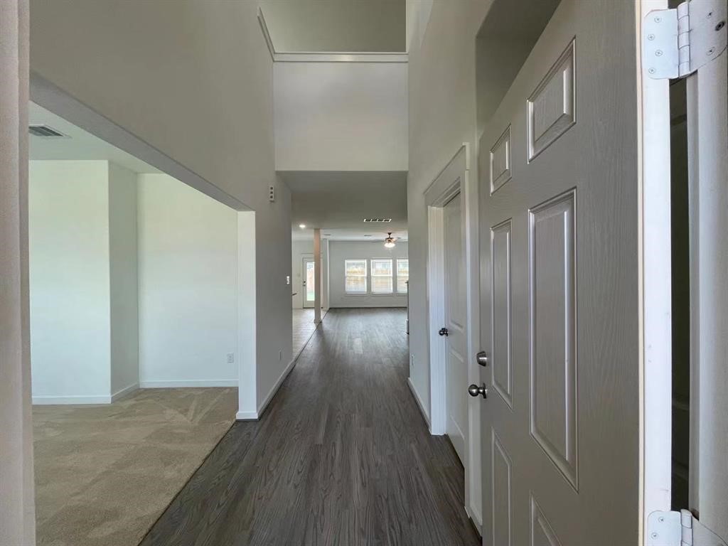 815 Summer Village Way Rosenberg, TX 77469 - Photo 2 of 21 a view of gallery with wooden floor
