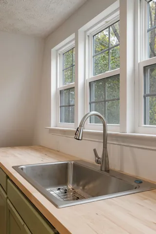 a view of an empty room and window