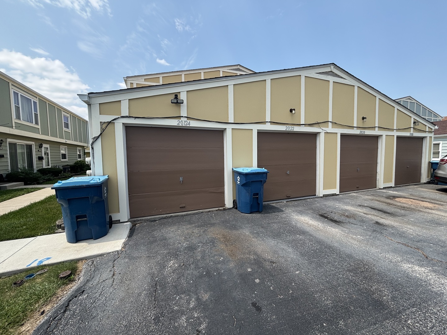 20124 Oak Lane Lynwood, IL 60411 - Photo 17 of 19 a front view of a house with a yard