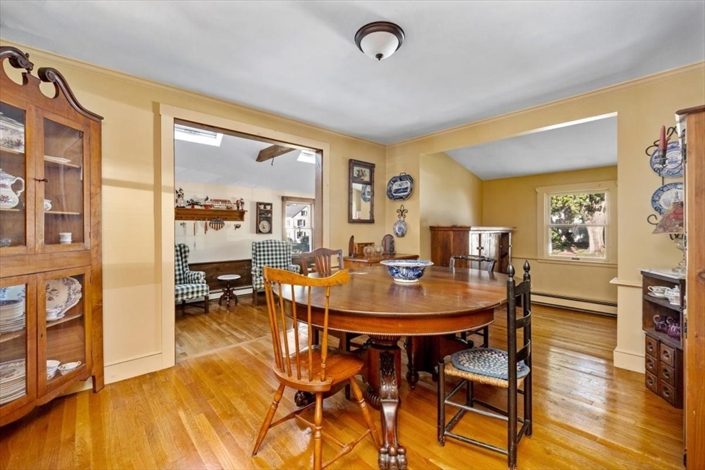 11 Sanborn Road Hingham, MA 02043 - Photo 11 of 33 a view of a dining room with furniture and wooden floor
