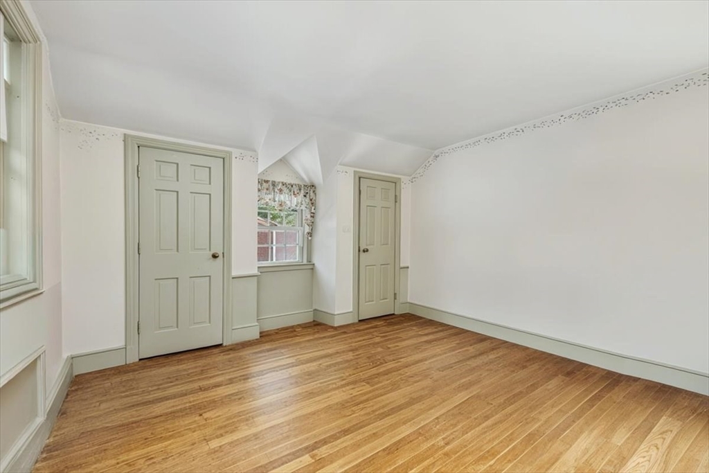 11 Sanborn Road Hingham, MA 02043 - Photo 14 of 33 an empty room with wooden floor and windows