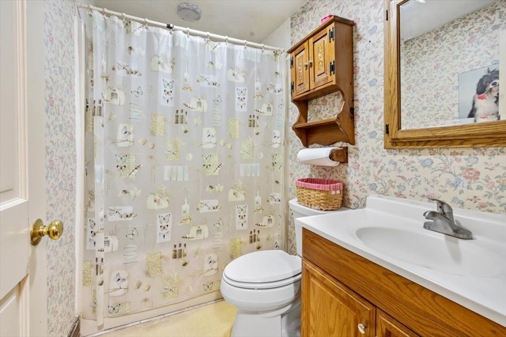 11 Sanborn Road Hingham, MA 02043 - Photo 15 of 33 a bathroom with a sink toilet and shower