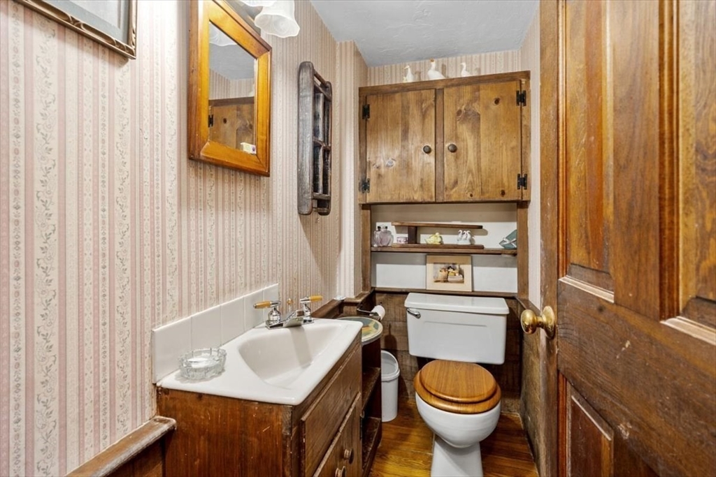 11 Sanborn Road Hingham, MA 02043 - Photo 16 of 33 a bathroom with a sink toilet and shower