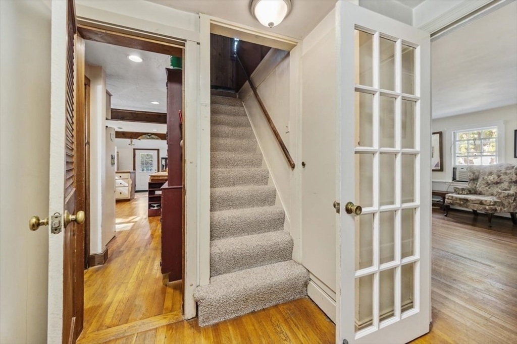 11 Sanborn Road Hingham, MA 02043 - Photo 17 of 33 a view of a hallway with a livingroom and furniture