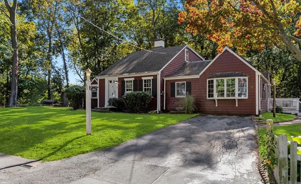 11 Sanborn Road Hingham, MA 02043 - Photo 28 of 33 a front view of a house with a yard and porch
