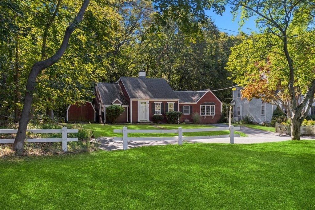 11 Sanborn Road Hingham, MA 02043 - Photo 29 of 33 a house with a big yard and large trees