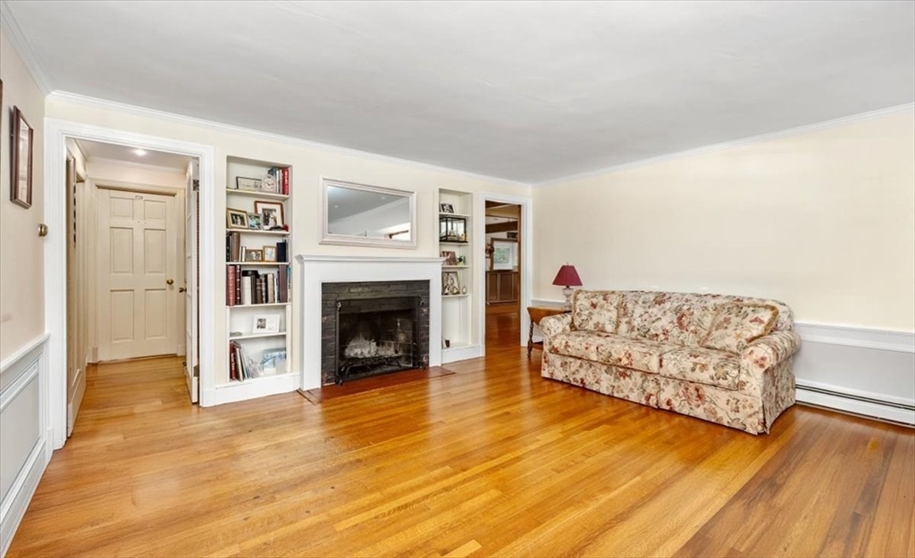 11 Sanborn Road Hingham, MA 02043 - Photo 4 of 33 a living room with furniture and a fireplace