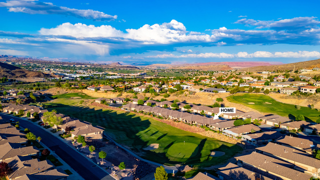 2212 Chippenham Court St. George, UT 84770 - Photo 60 of 75 Aerial perspective of suburban area featuring a mountainous background and a golf course