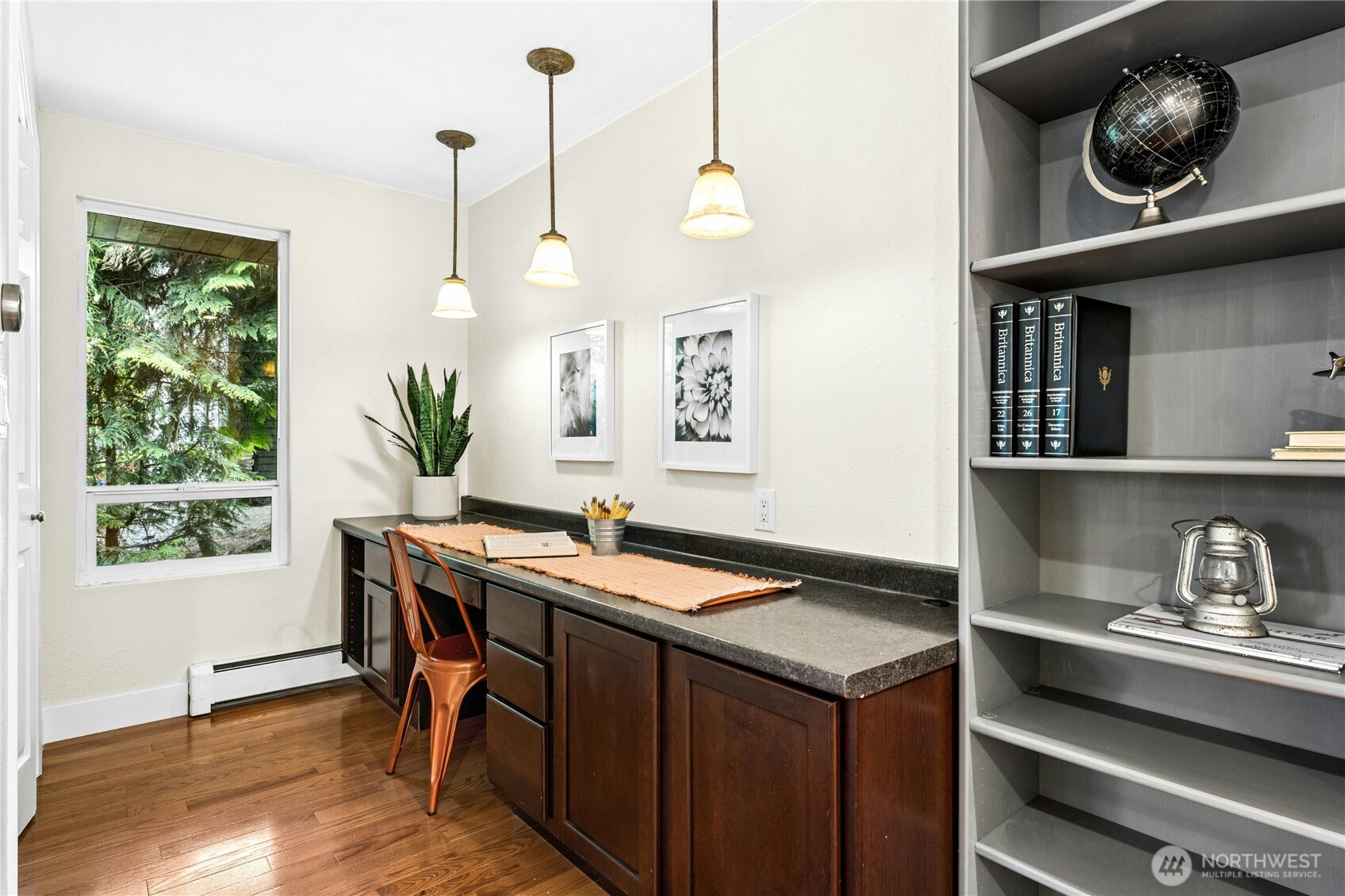 18152 145th Avenue Southeast Renton, WA 98058 - Photo 27 of 40 a kitchen that has a sink a stove and a table
