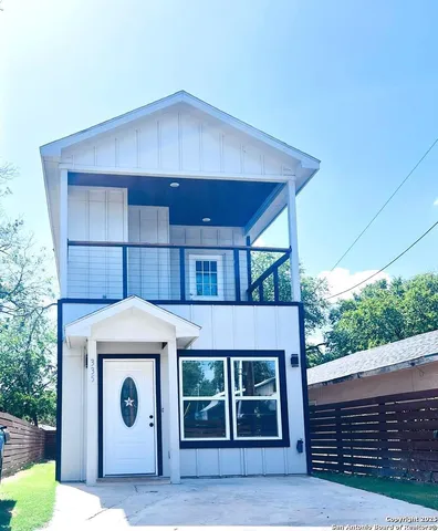 a front view of a house with a garage