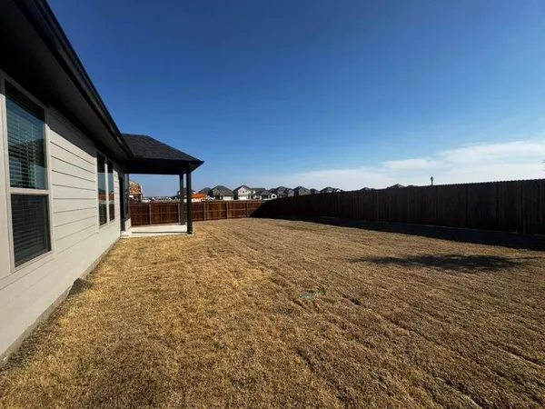 a view of outdoor space and yard
