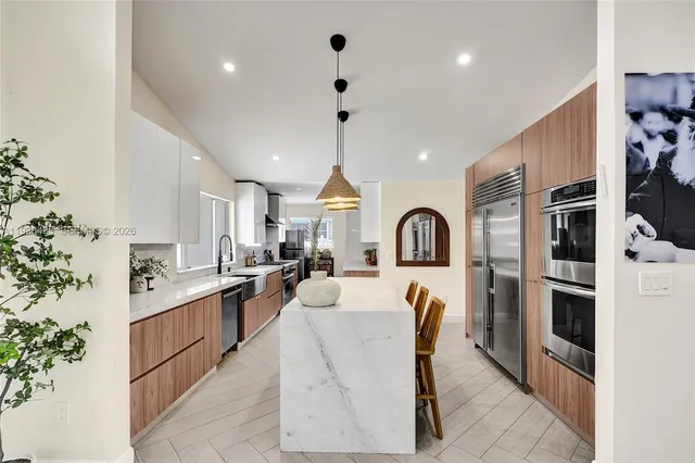 a view of a storage & utility room with washer and dryer