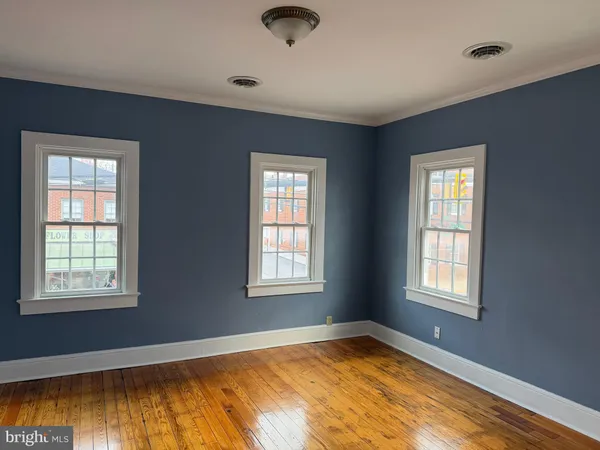 a view of an empty room and window