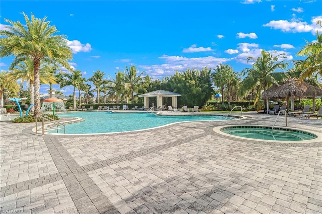 2391 Heydon Circle East Naples, FL 34120 - Photo 32 of 42 a view of a fountain in front of a house with a fountain
