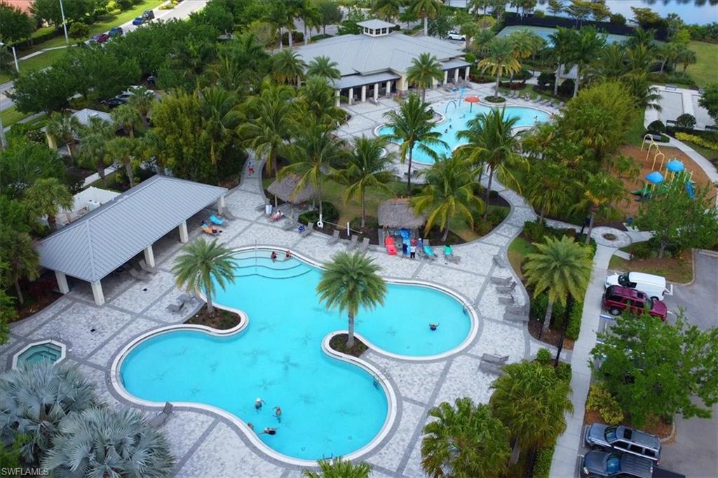 2391 Heydon Circle East Naples, FL 34120 - Photo 34 of 42 an aerial view of a house with swimming pool and outdoor seating