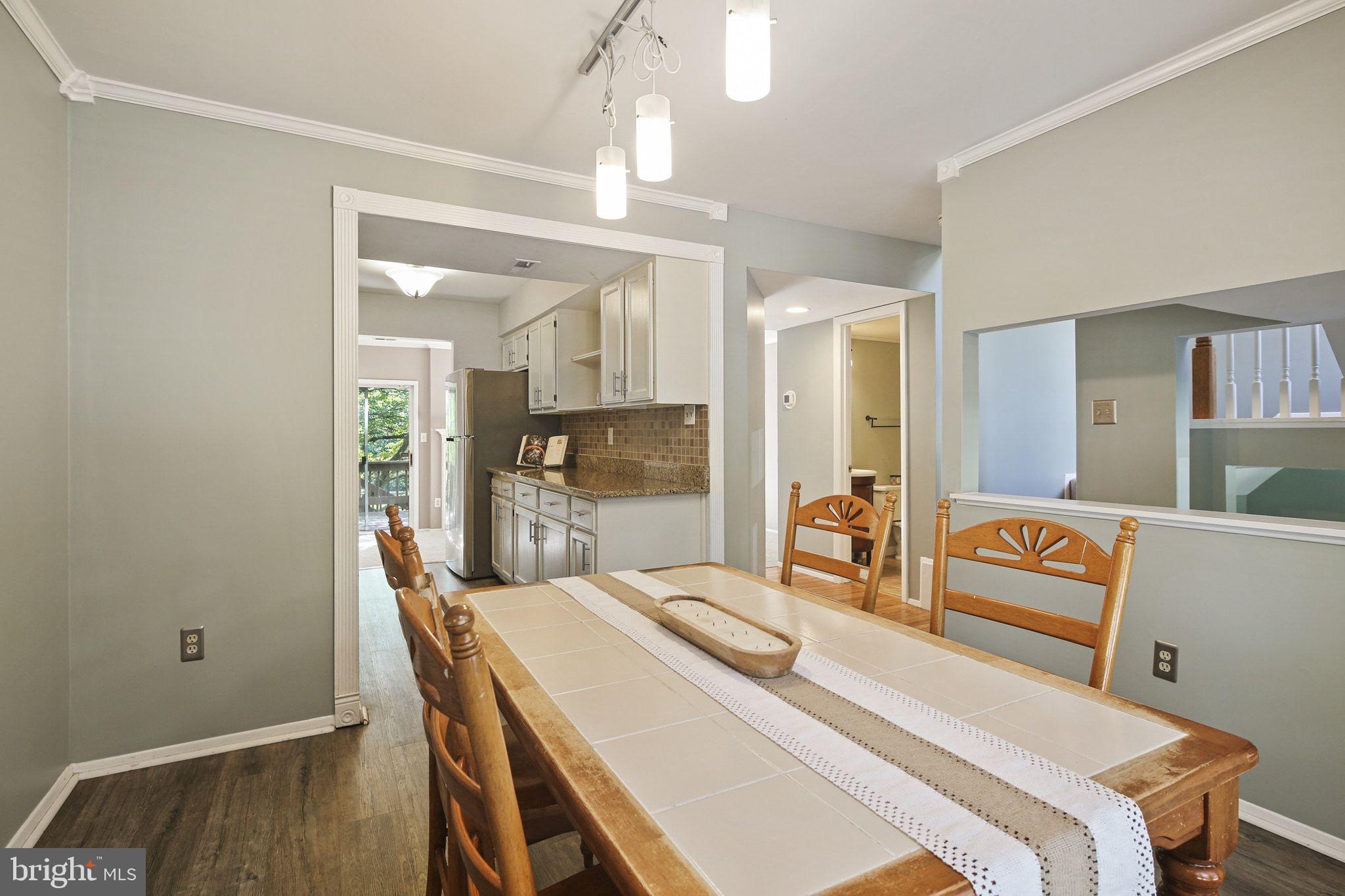 8205 Tall Trees Court Ellicott City, MD 21043 - Photo 6 of 37 Open dining area to the kitchen