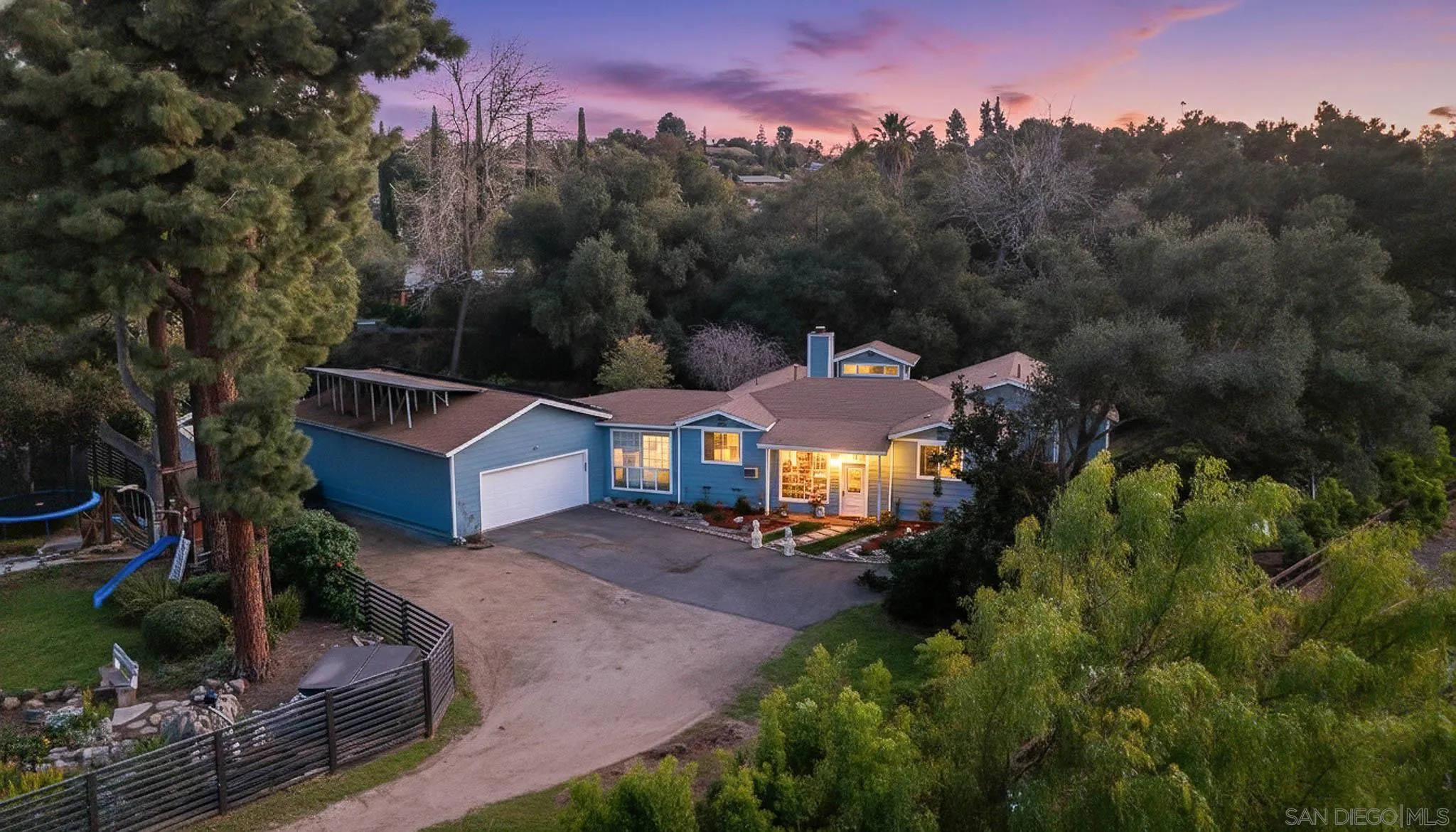 1553 Ranchwood Lane Fallbrook, CA 92028 - Photo 3 of 60 an aerial view of a house with a garden