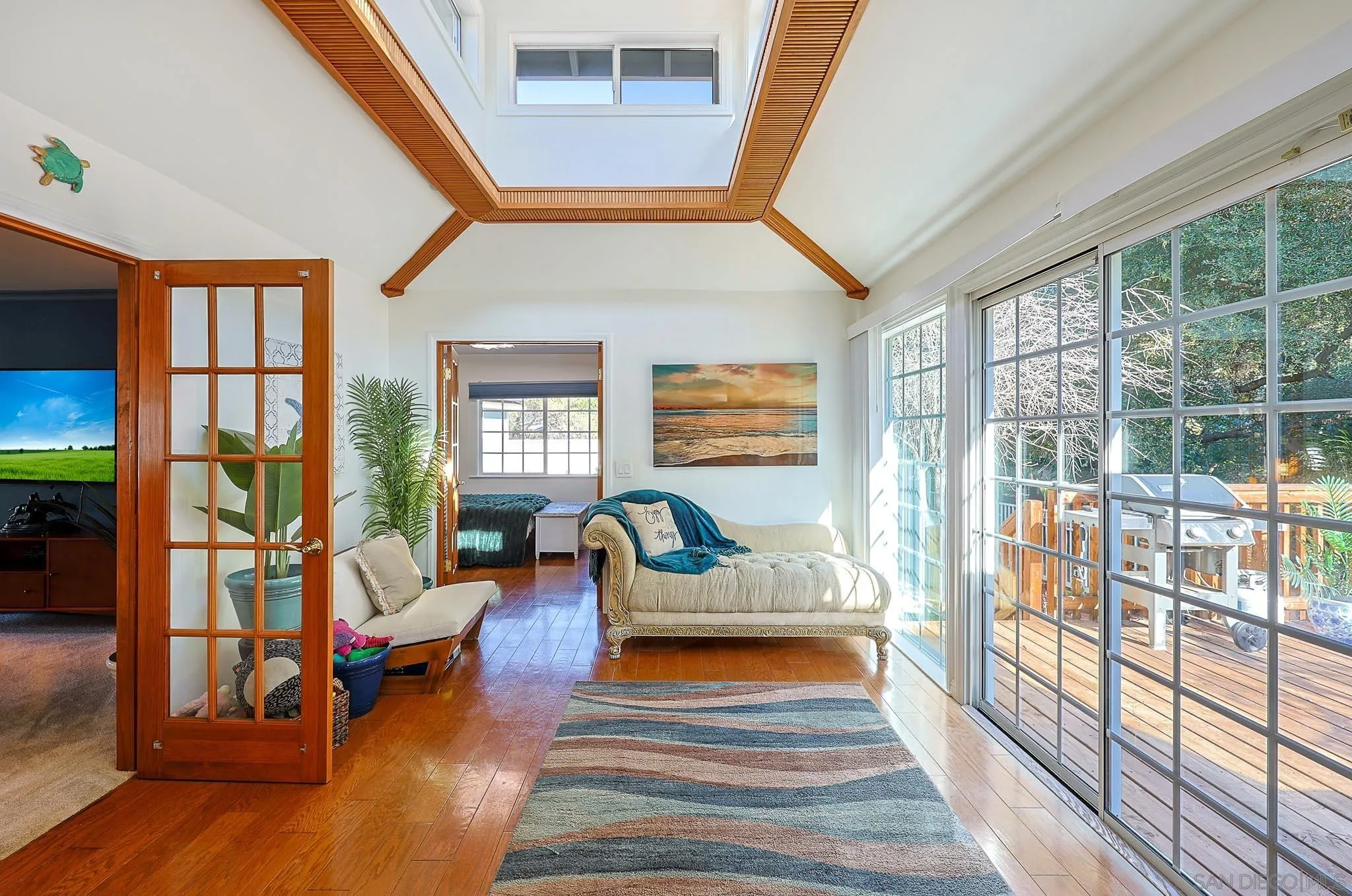 1553 Ranchwood Lane Fallbrook, CA 92028 - Photo 32 of 60 a bedroom with furniture and a large window