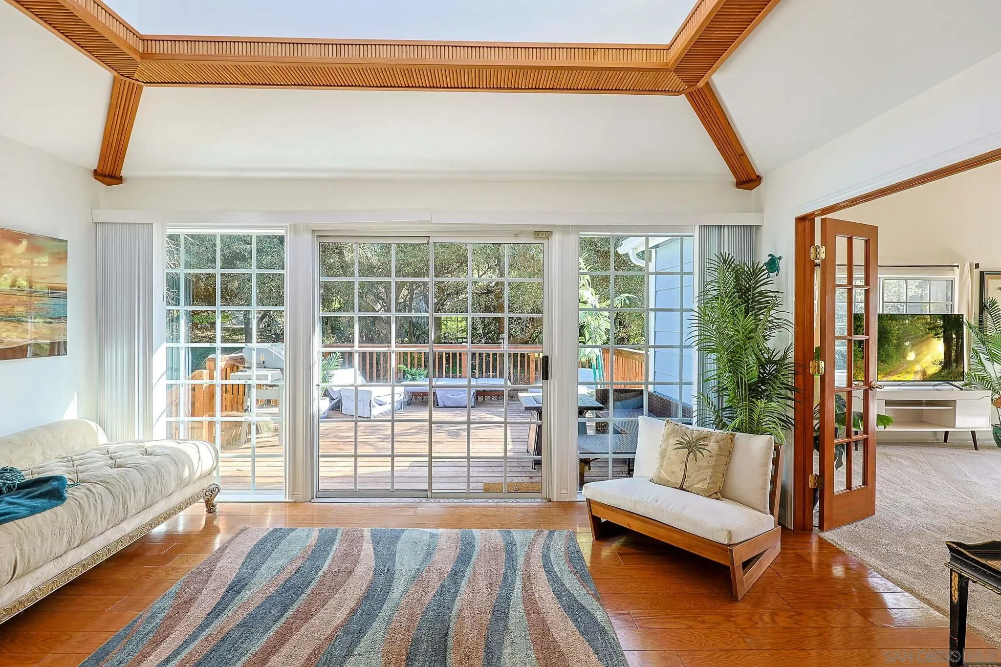 1553 Ranchwood Lane Fallbrook, CA 92028 - Photo 33 of 60 a living room with furniture and a large window