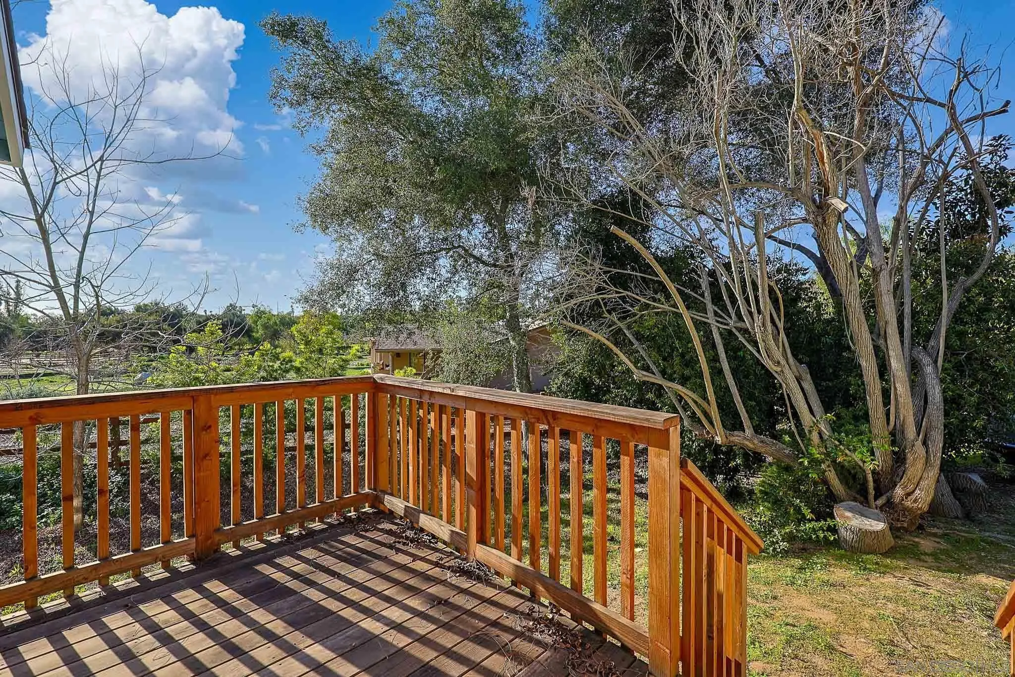 1553 Ranchwood Lane Fallbrook, CA 92028 - Photo 51 of 60 a view of wooden balcony with outdoor space