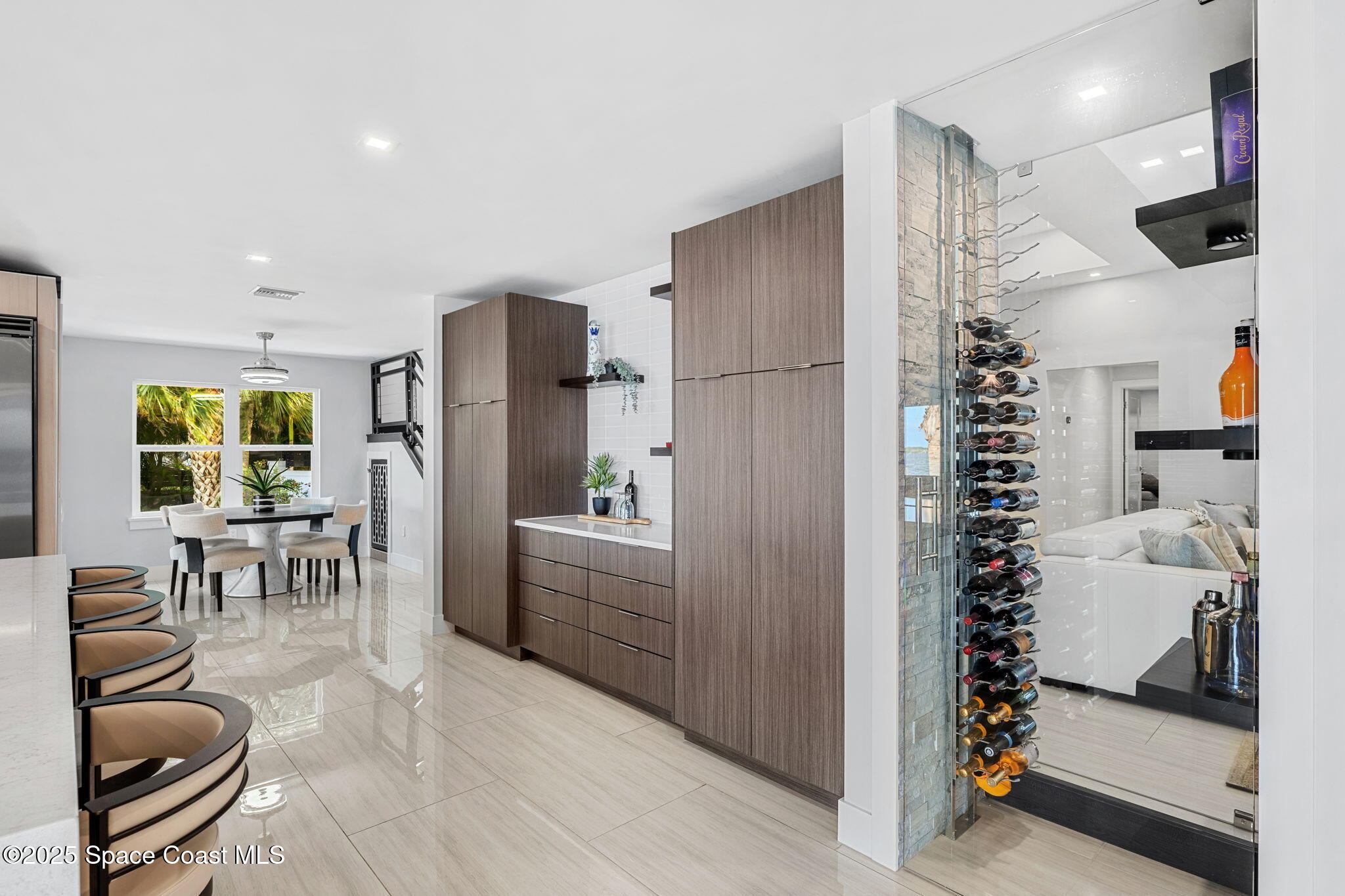 6225 Capstan Court Rockledge, FL 32955 - Photo 17 of 73 a kitchen with granite countertop a refrigerator and a sink