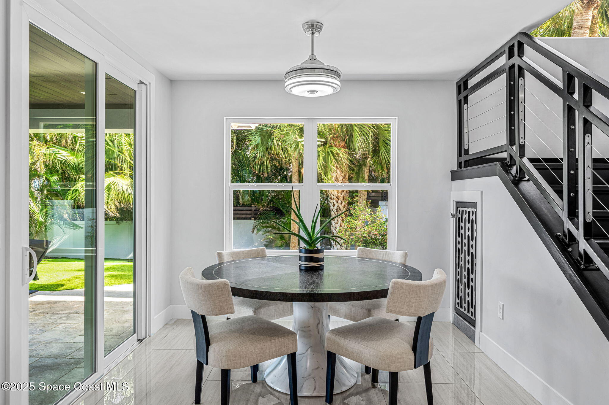 6225 Capstan Court Rockledge, FL 32955 - Photo 18 of 73 a dining room with furniture and window