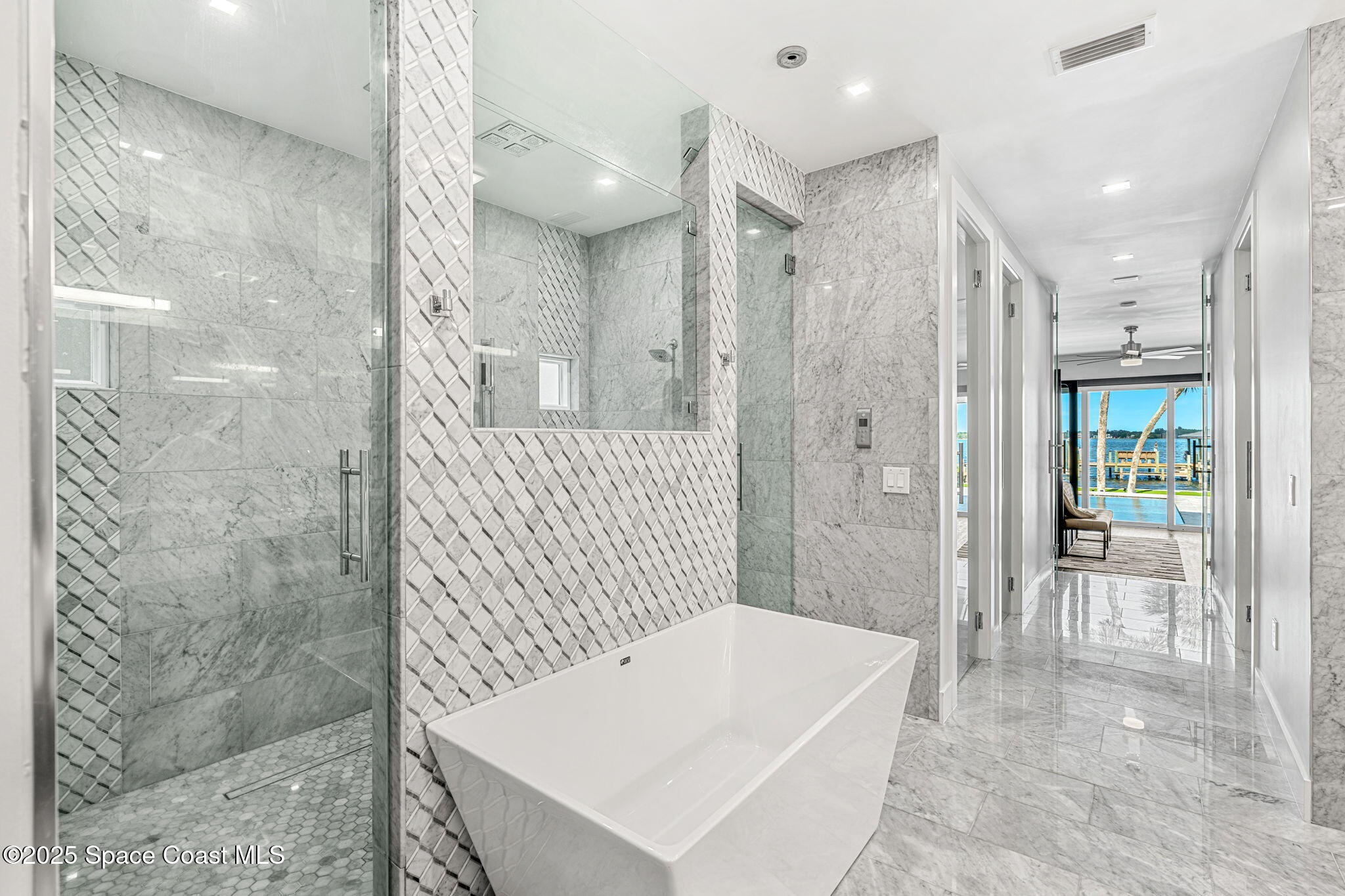 6225 Capstan Court Rockledge, FL 32955 - Photo 25 of 73 a bathroom with a bathtub a shower and a sink