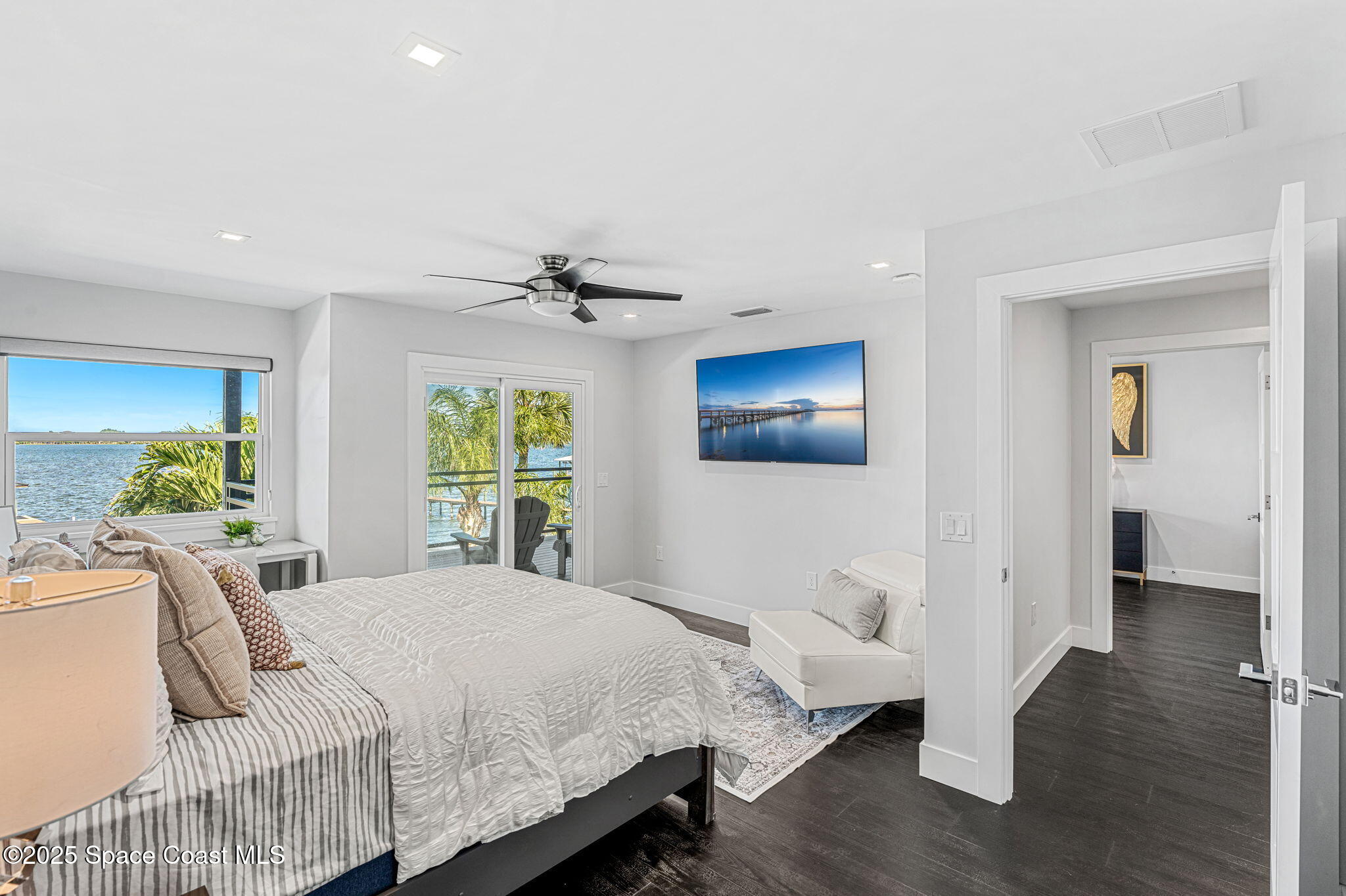 6225 Capstan Court Rockledge, FL 32955 - Photo 34 of 73 a bedroom with a bed and wooden floor