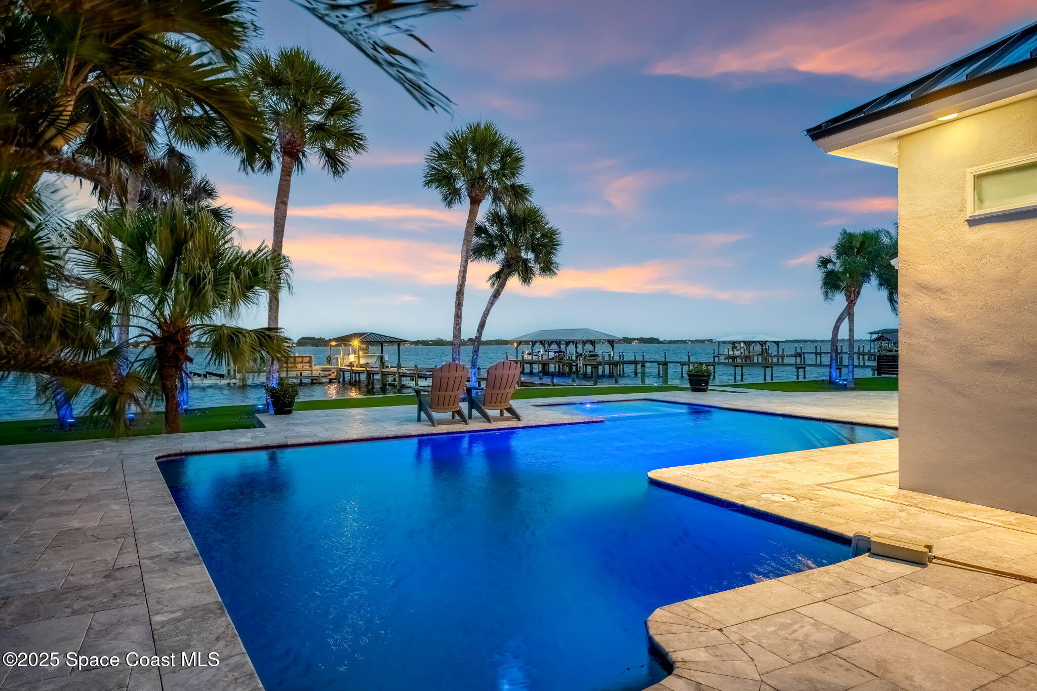 6225 Capstan Court Rockledge, FL 32955 - Photo 40 of 73 a view of a swimming pool with lounge chairs