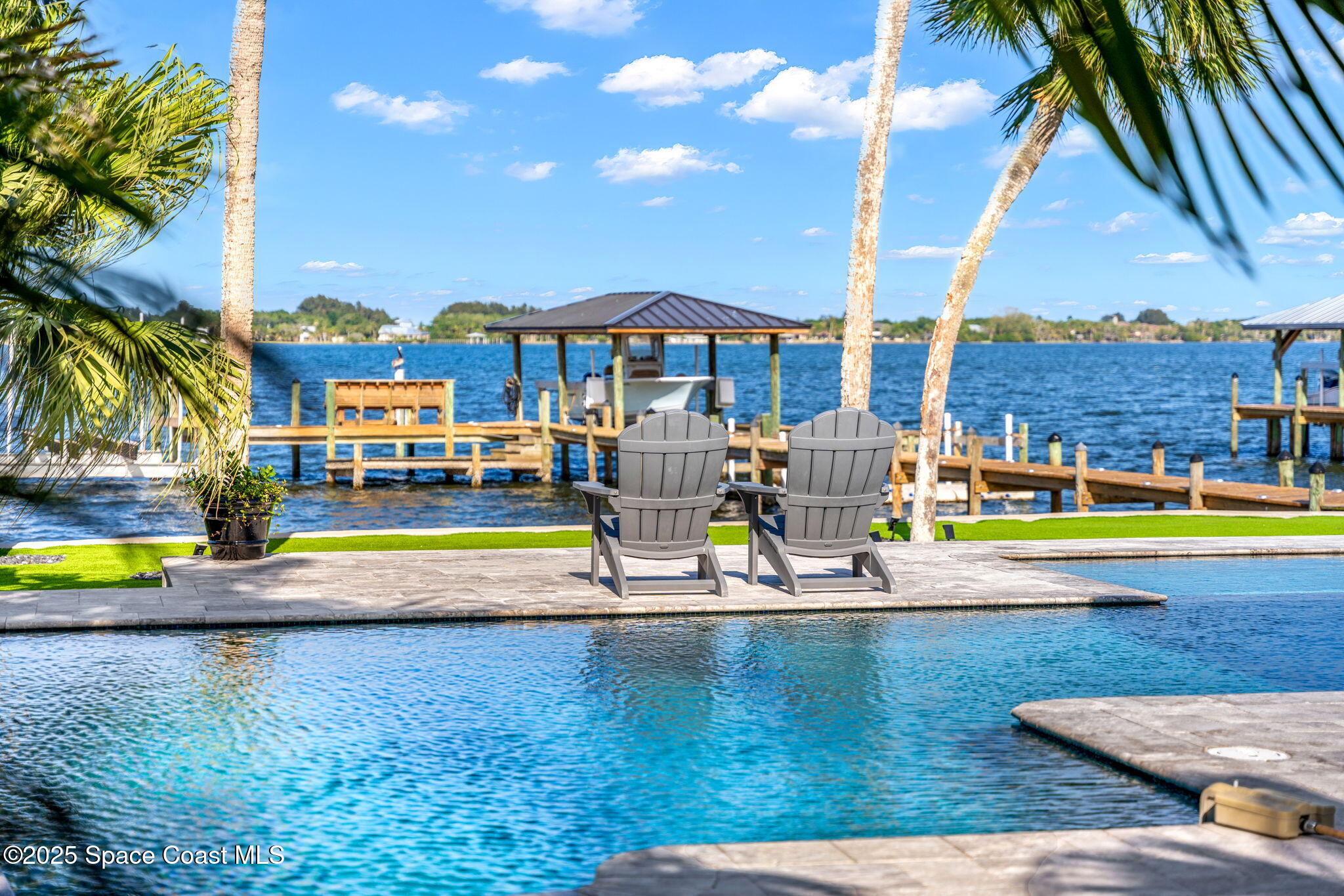 6225 Capstan Court Rockledge, FL 32955 - Photo 41 of 73 a view of swimming pool with outdoor seating and a patio