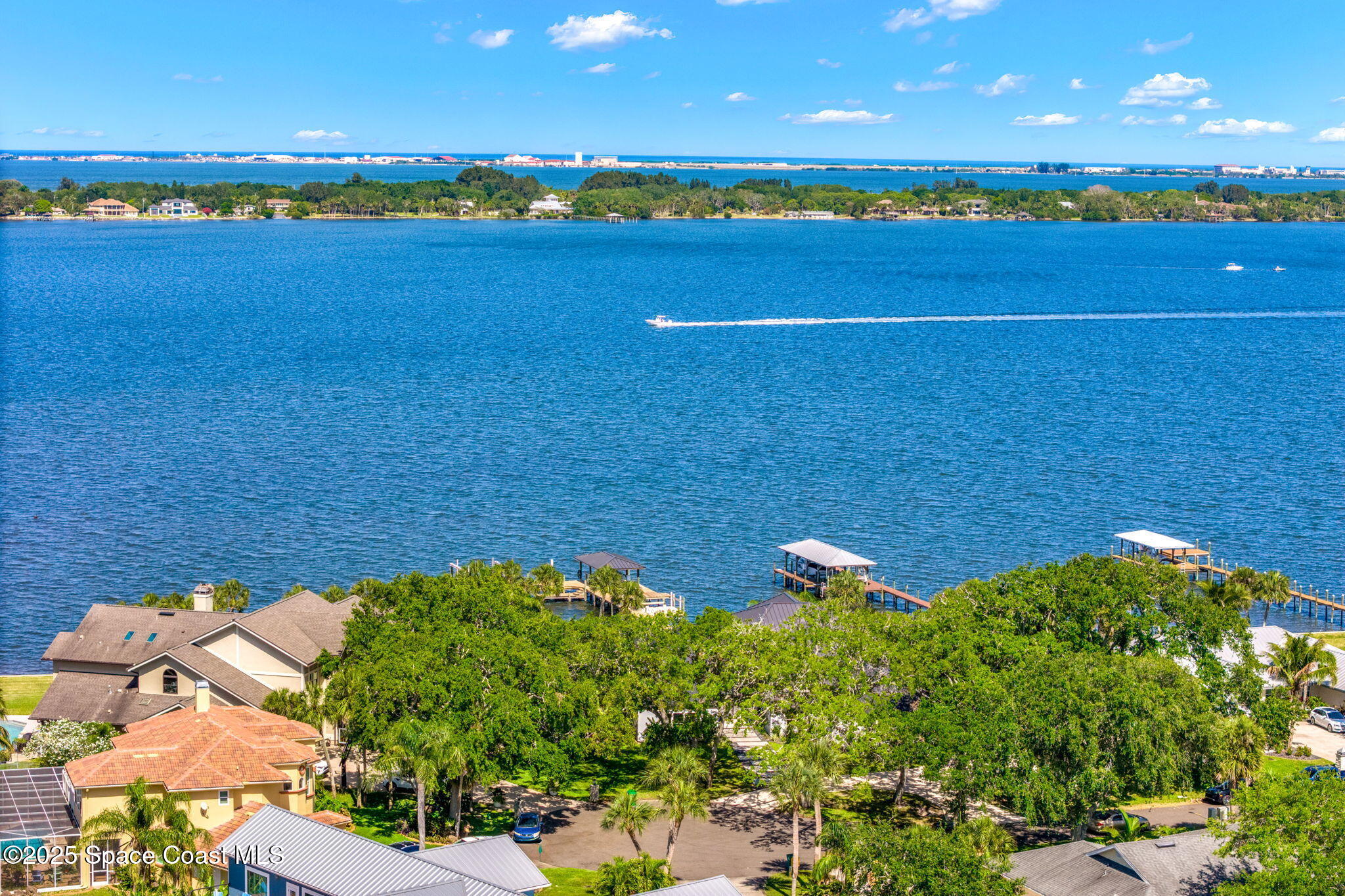 6225 Capstan Court Rockledge, FL 32955 - Photo 57 of 73 a view of a lake with a city view