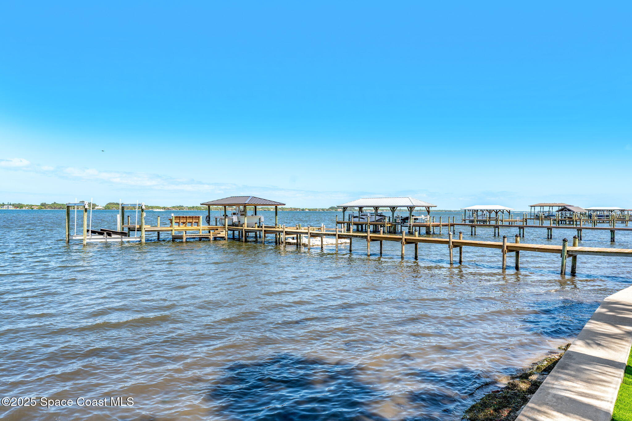 6225 Capstan Court Rockledge, FL 32955 - Photo 59 of 73 a view of a swimming pool and an ocean