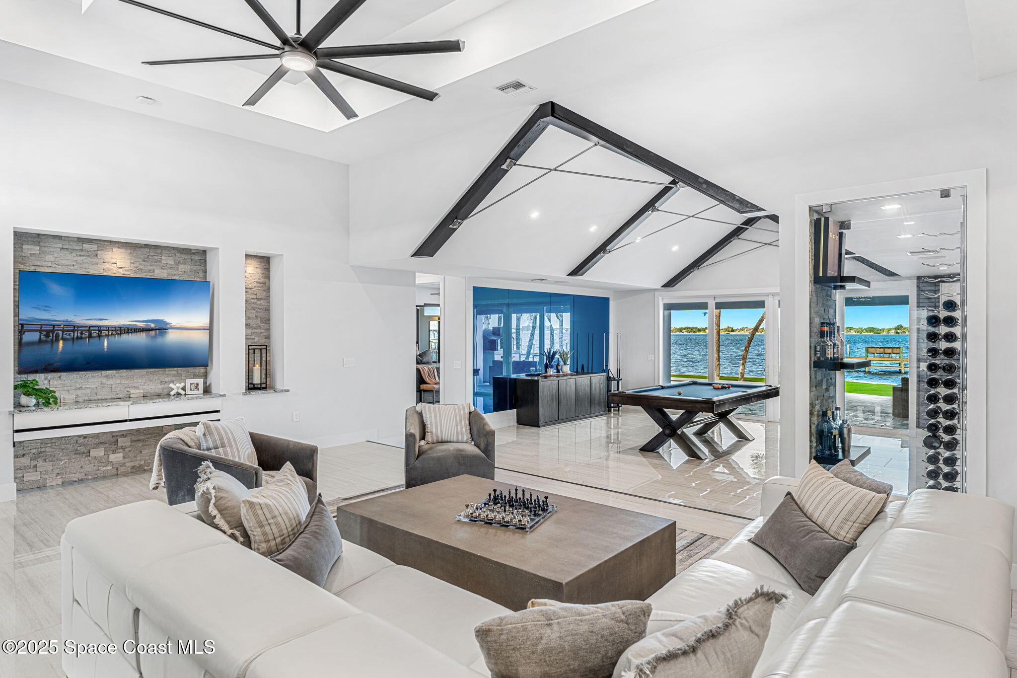 6225 Capstan Court Rockledge, FL 32955 - Photo 7 of 73 a living room with furniture and a flat screen tv