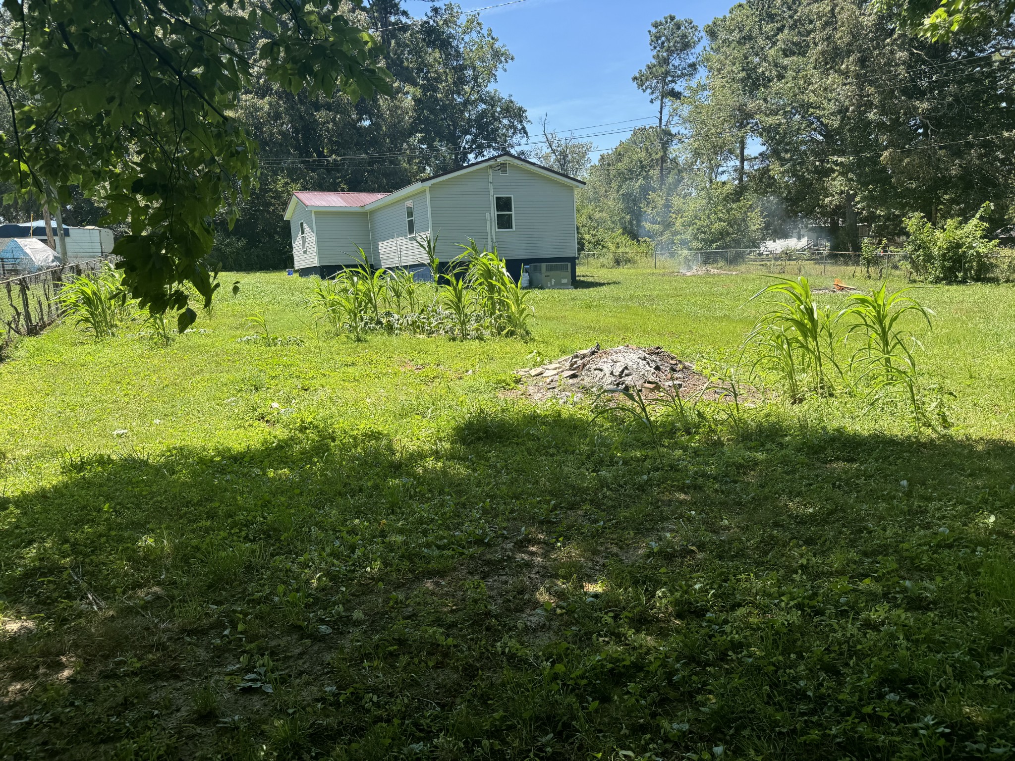 499 Carter Blake Road Tullahoma, TN 37388 - Photo 7 of 15 a front view of a house with garden