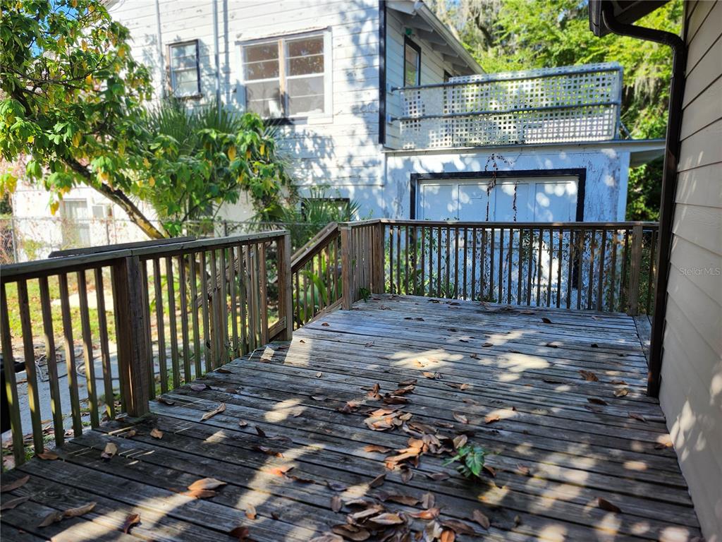 422 Northwest 9th Avenue Gainesville, FL 32601 - Photo 3 of 9 a view of a street with wooden fence