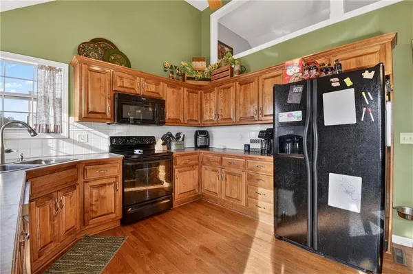 $347,500 | 714 South Sunset Lane, Raymore, MO 64083