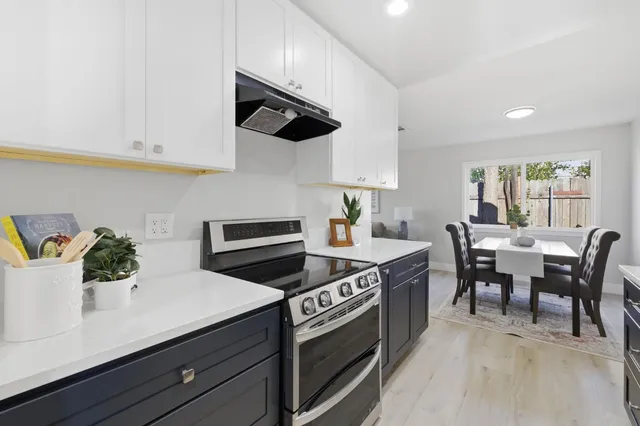 a bathroom with a sink a mirror and shower