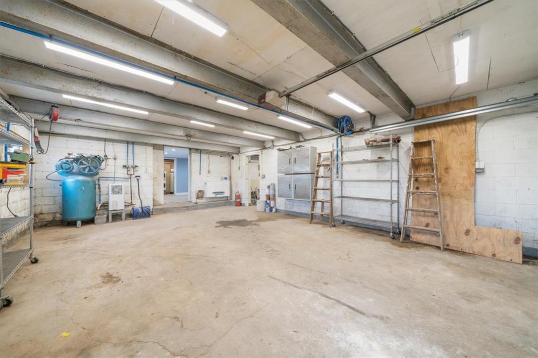 988 Hoch Road Danielsville, PA 18038 - Photo 20 of 29 A spacious, well-lit garage offers ample room for vehicles and organized storage.