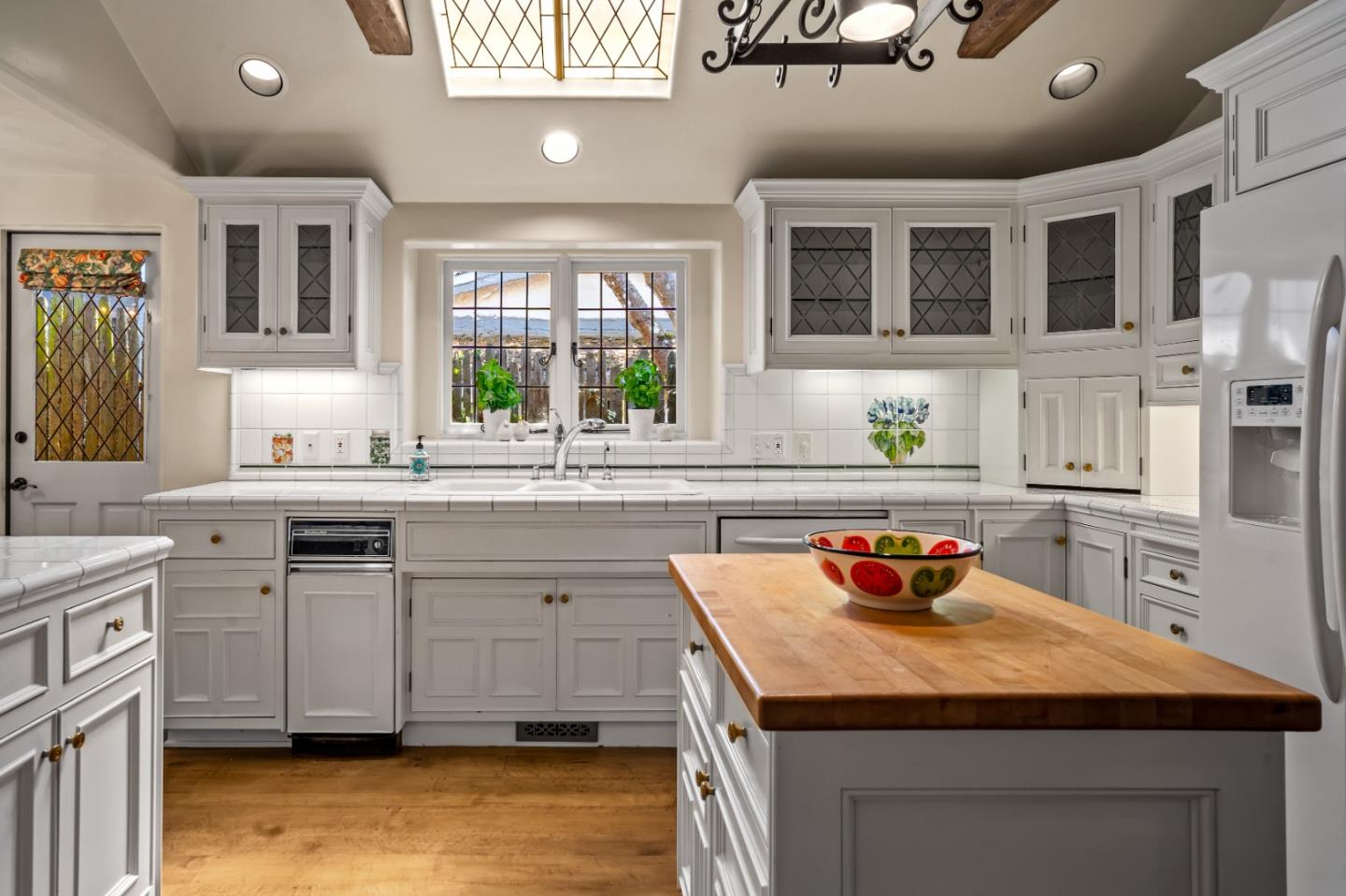 0 Southeast Corner Santa Rita And 6th Carmel, CA 93921 - Photo 11 of 29 a kitchen with stainless steel appliances granite countertop a sink dishwasher stove and oven