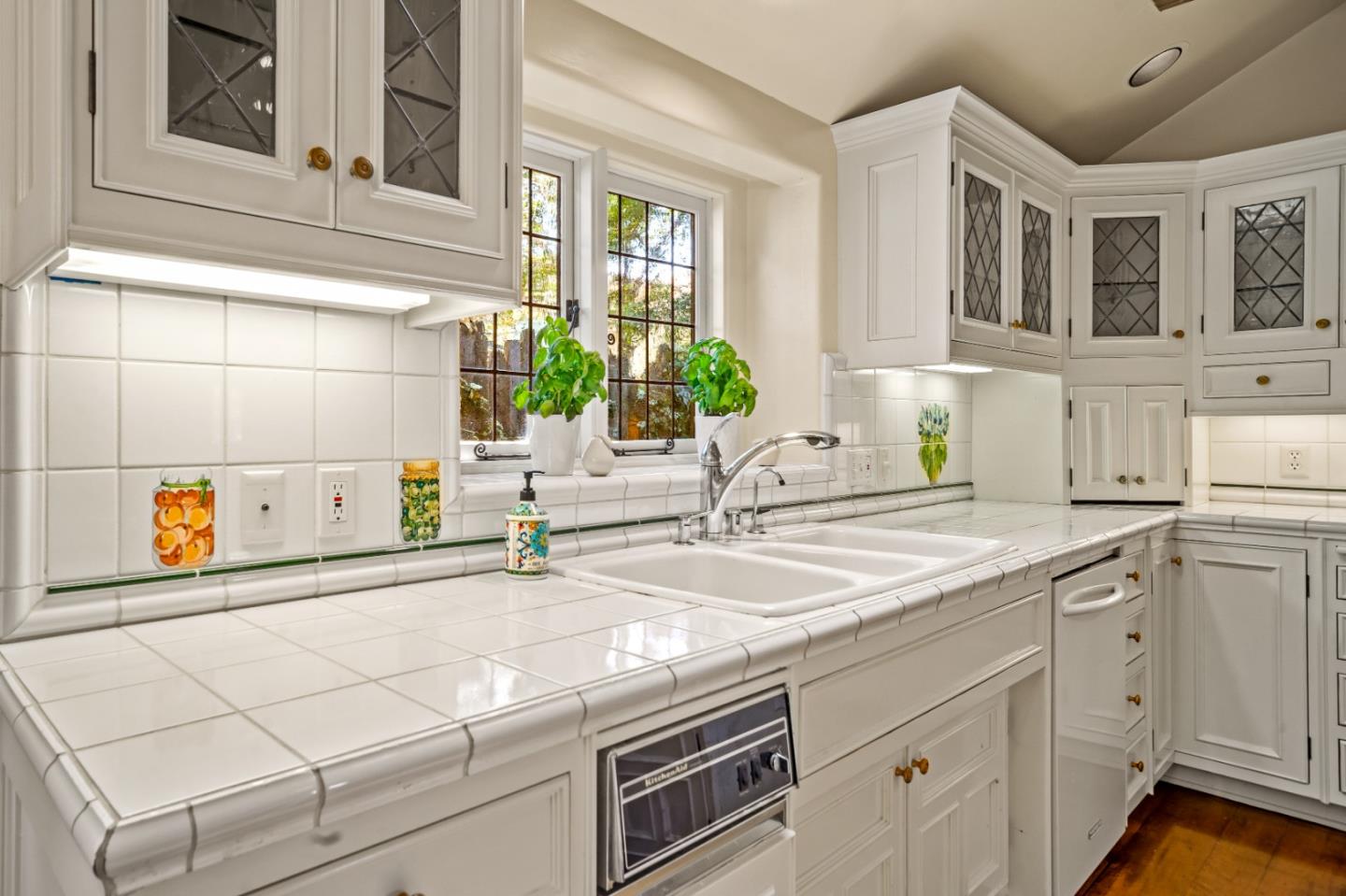 0 Southeast Corner Santa Rita And 6th Carmel, CA 93921 - Photo 13 of 29 a kitchen with stainless steel appliances cabinets and a window