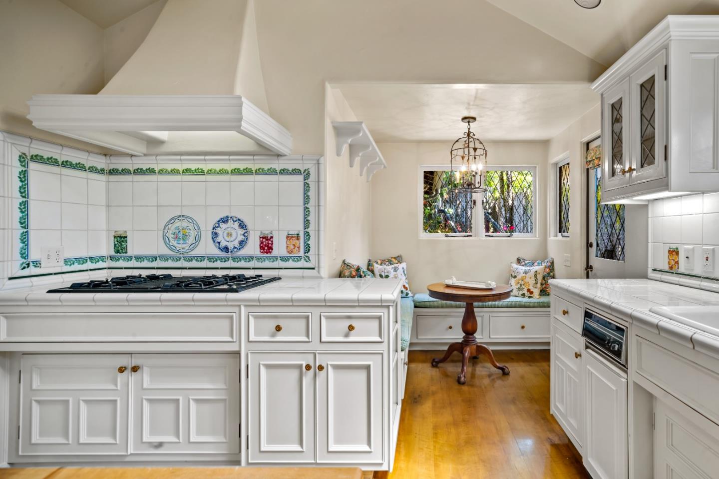 0 Southeast Corner Santa Rita And 6th Carmel, CA 93921 - Photo 15 of 29 a kitchen with a stove and cabinets