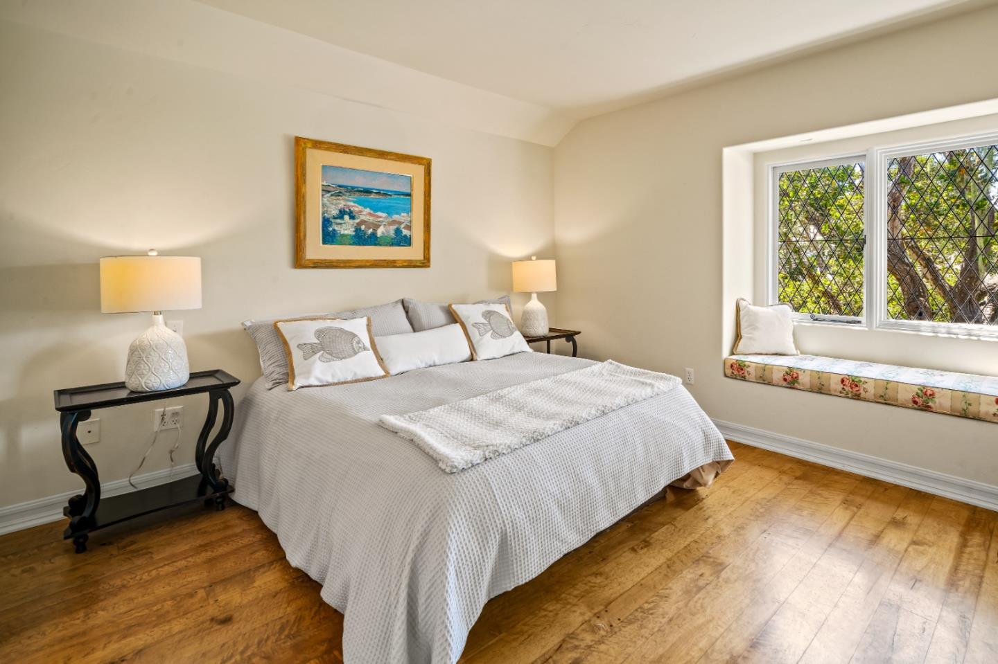 0 Southeast Corner Santa Rita And 6th Carmel, CA 93921 - Photo 17 of 29 a bedroom with bed and window