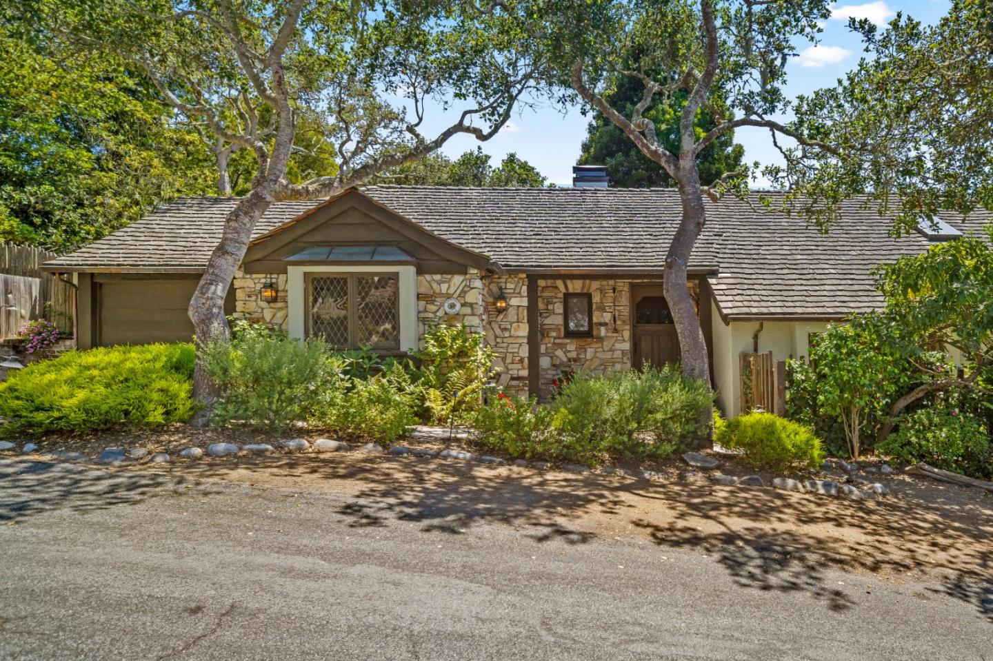 0 Southeast Corner Santa Rita And 6th Carmel, CA 93921 - Photo 2 of 29 a house with a tree in front of it