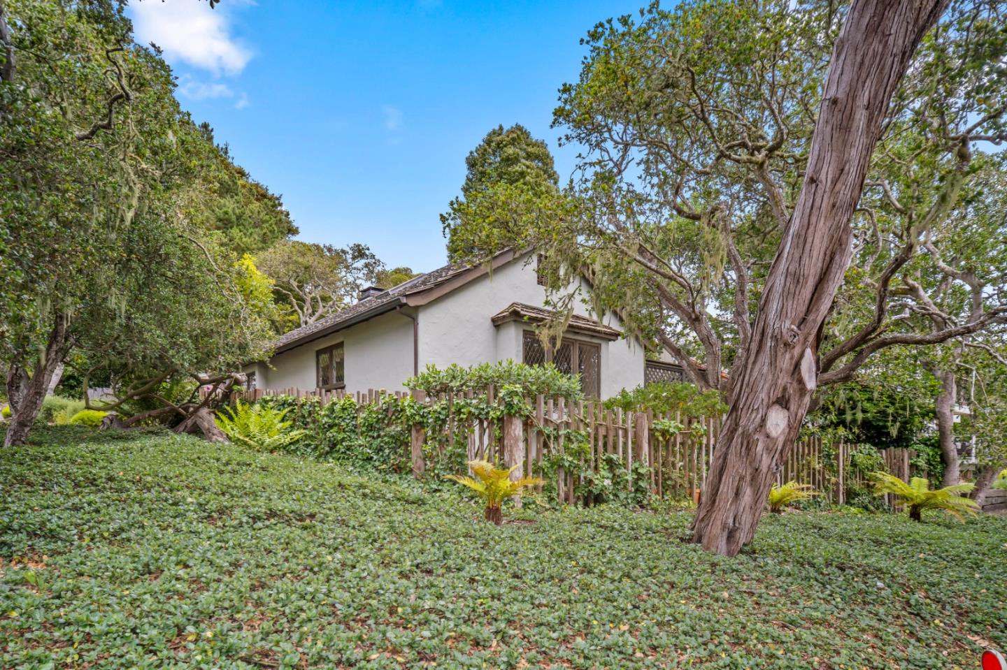 0 Southeast Corner Santa Rita And 6th Carmel, CA 93921 - Photo 28 of 29 a view of a house with a tree in a yard