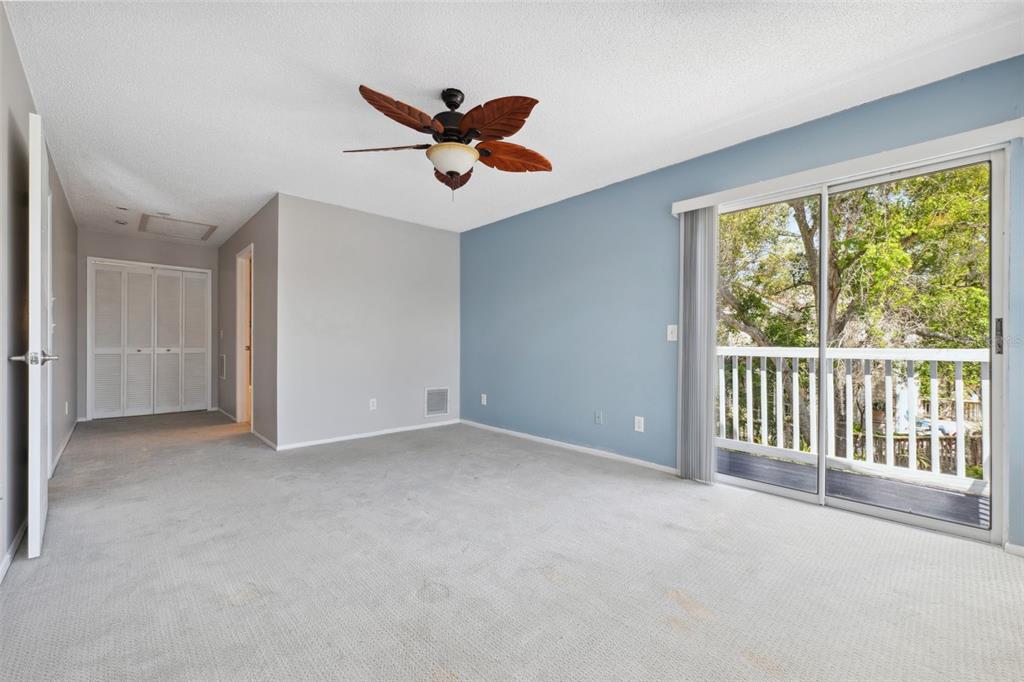 428 West Klosterman Road Palm Harbor, FL 34683 - Photo 14 of 44 a view of an empty room with a window