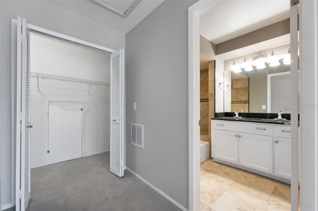 428 West Klosterman Road Palm Harbor, FL 34683 - Photo 15 of 44 a bathroom with a sink and a mirror