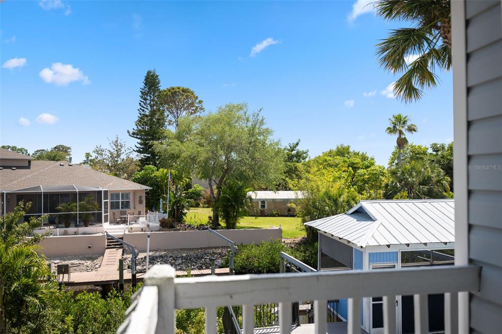 428 West Klosterman Road Palm Harbor, FL 34683 - Photo 27 of 44 a front view of a house with a yard