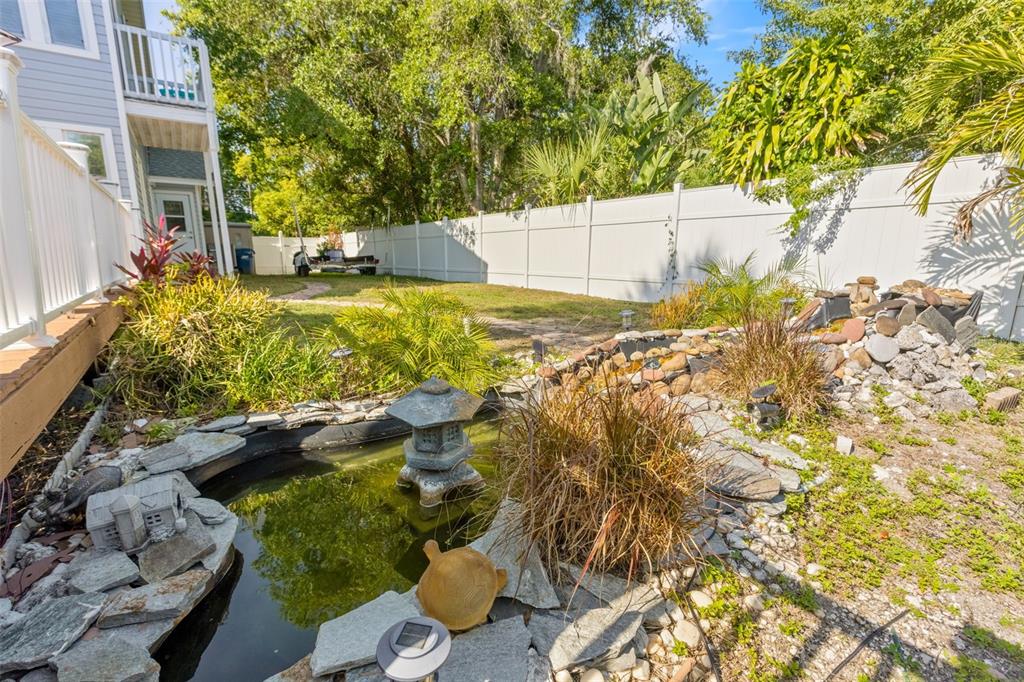 428 West Klosterman Road Palm Harbor, FL 34683 - Photo 37 of 44 a view of a yard with plants