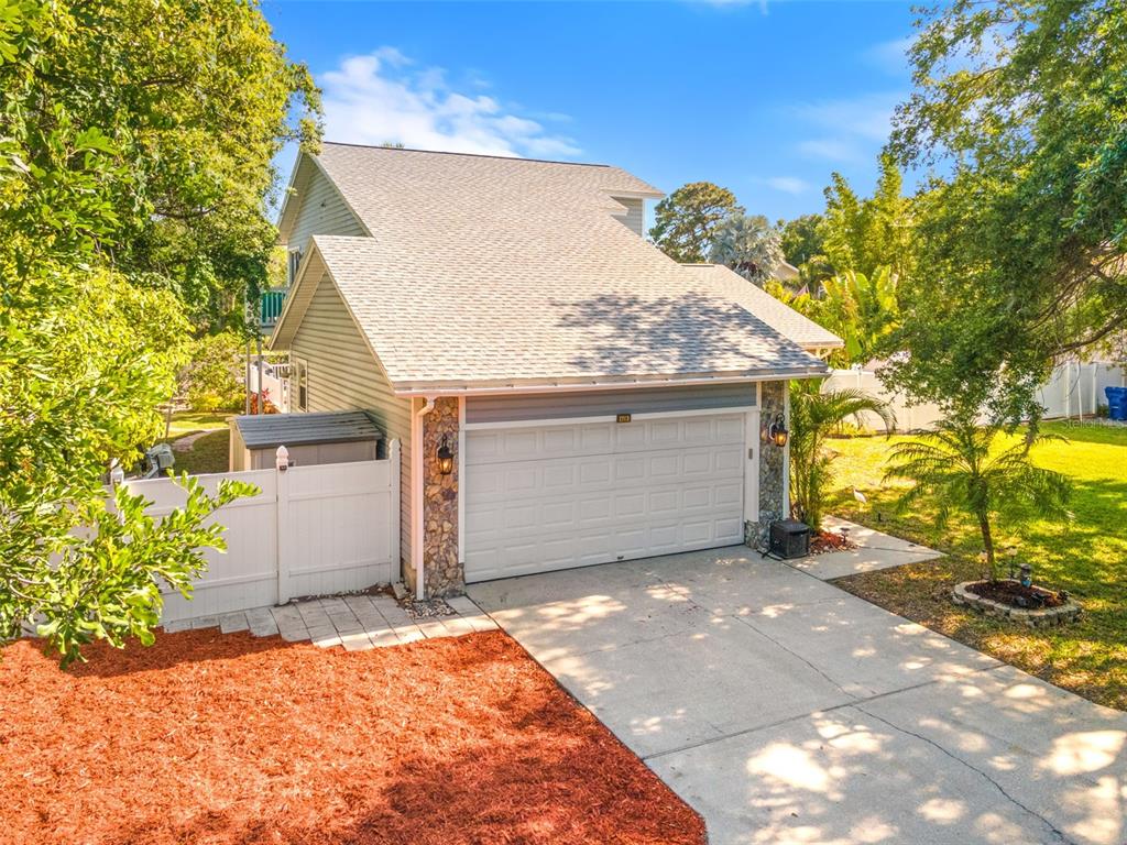 428 West Klosterman Road Palm Harbor, FL 34683 - Photo 41 of 44 a view of a garage