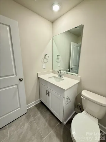a bathroom with a toilet and a bathtub